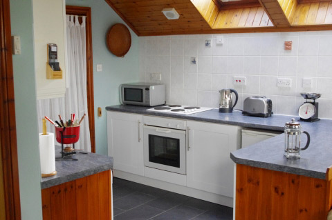 well equipped
                        kitchen in this comfortable and quiet holiday
                        apartment